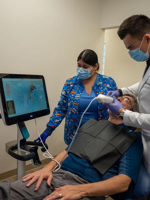 Dr. Ladzinski with a patient, tampa palms fl